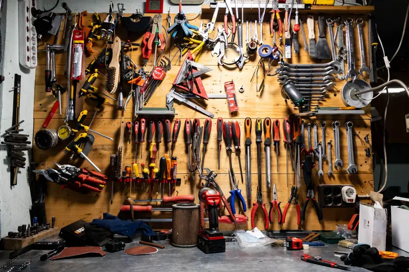 A well-organized array of tools on a workshop pegboard wall, ideal for DIY and carpentry projects